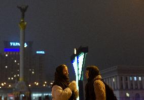 Lighting Hanukkah candles in Kyiv