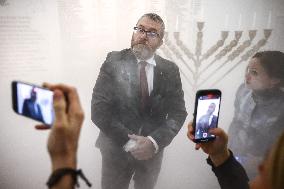 Far-right Polish MP Extinguishes Hanukkah Candle In Parliament