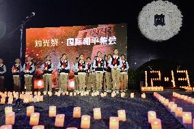 CHINA-NANJING MASSACRE VICTIMS-CANDLE LIGHT-COMMEMORATION (CN)