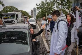 Catalan Public Health Workers Cut The Coastal Round Of Barcelona.