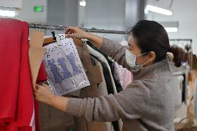 CHINA-TIANJIN-SHOE AND CLOTHING BRAND (CN)