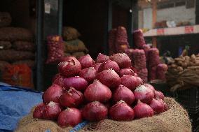 Selling Onions at an Outdoor Market - India