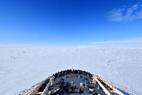 Japanese icebreaker ship plows through Antarctic