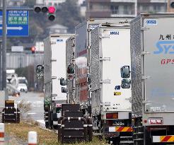Trucks in southwestern Japan city of Fukuoka