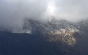 Season's first snowcap on Sakurajima volcano