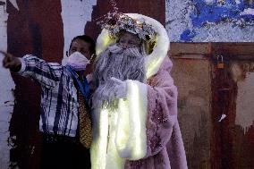 Illuminated Santa Claus Traveling  On  The Mexico City Metro