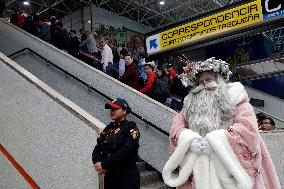 Illuminated Santa Claus Traveling  On  The Mexico City Metro