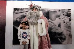 Illuminated Santa Claus Traveling  On  The Mexico City Metro