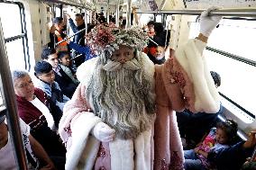 Illuminated Santa Claus Traveling  On  The Mexico City Metro