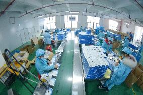 A Pharmaceutical Packaging Workshop in Congjiang
