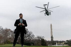 President Joe Biden departs the White House