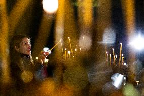 Believers Hold Candles During The Christmas Eve Celebratory Liturgy In Sofia.