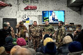 Defenders of Huliaipole sing carols for local residents