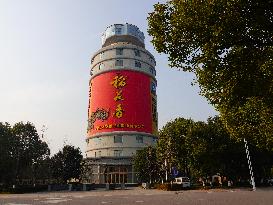 DaoHuaxiang Group Wne Bottle Shaped Office Building in Yichang