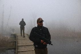 Indian Policemen Patrol In Srinagar