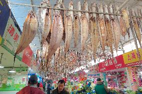 Preserved Products Hang in a Market in Shanghai