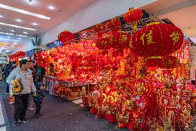 People Shop 2024 New Year Decorations in Chongqing