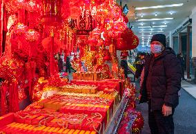 People Shop 2024 New Year Decorations in Chongqing