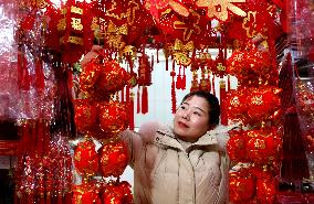 People Shop 2024 New Year Decorations in Lianyungang