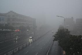 A Foggy Street in Fuyang