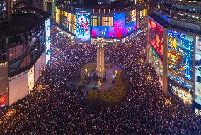 People Gather To Listen To The New Year Bell To Welcome 2024 in Chongqing