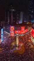 People Gather To Listen To The New Year Bell To Welcome 2024 in Chongqing