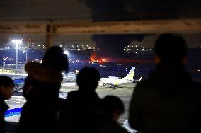 Japan Airlines aircraft catches fire at Haneda airport