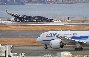 JAL plane fire at Haneda airport