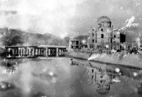 Wrecked Hiroshima Prefectural Industrial Promotion Hall (now the A-bomb Dome) and Aioi Bridge