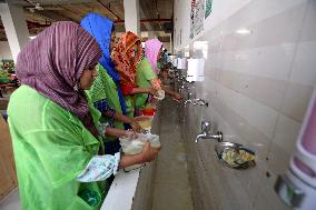 Worker Having Food In A Garments Factory - Dhaka