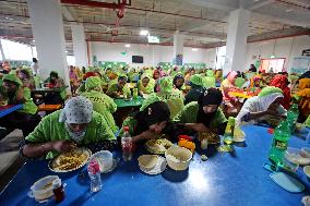 Worker Having Food In A Garments Factory - Dhaka