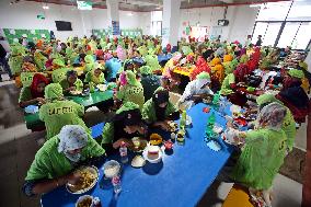 Worker Having Food In A Garments Factory - Dhaka