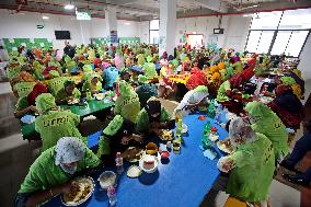 Worker Having Food In A Garments Factory - Dhaka