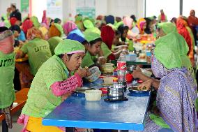 Worker Having Food In A Garments Factory - Dhaka