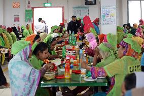 Worker Having Food In A Garments Factory - Dhaka