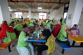 Worker Having Food In A Garments Factory - Dhaka