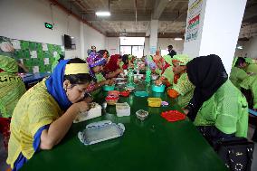 Worker Having Food In A Garments Factory - Dhaka