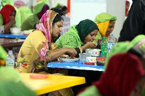 Worker Having Food In A Garments Factory - Dhaka