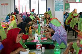 Worker Having Food In A Garments Factory - Dhaka