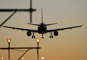 Aircraft landing at night at Barcelona airport