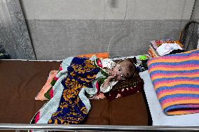 Child Suffer Cold Diseases In Dhaka