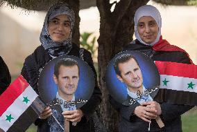 Syria's President Bashar Al-Assad Supporters