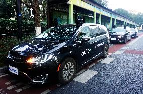 A Driverless Taxi RoboTaxi Runs on A Road in Hangzhou