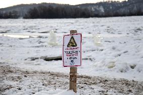 Icebound Dnipro River banks in Kyiv