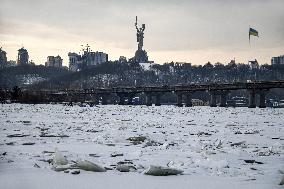 Icebound Dnipro River banks in Kyiv