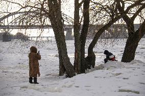 Icebound Dnipro River banks in Kyiv