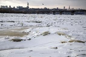 Icebound Dnipro River banks in Kyiv