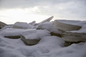 Icebound Dnipro River banks in Kyiv