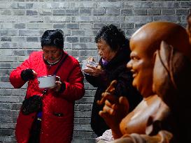 People Receive The BUDDHA PORRIDGE in Yichang