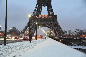 Streets Of Paris Covered With A Snow Blanket